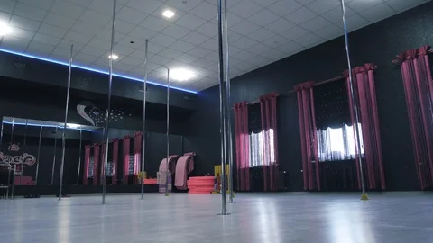 Interior of modern dancing studio for pole dancing only. Video stock 105381904
