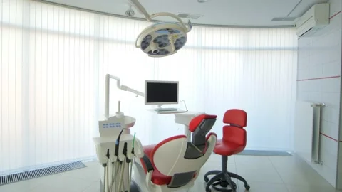 The interior of a Modern Dental Office, An empty dentist's office with equipment Stock Footage 167434299