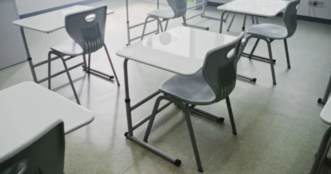 Interior of Modern Empty Elementary School Classroom with Working Desks and Stock Footage 315532403