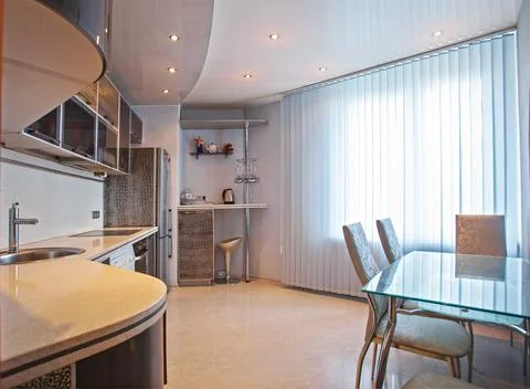 Interior of a modern kitchen with built-in appliances in gray tones Foto stock