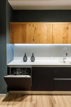 Interior of modern kitchen with built-in dishwasher 스톡 사진