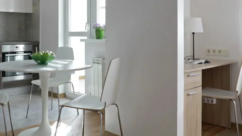 Interior of modern kitchen in new apartment in scandinavian style. Motion view. Video stock 90051775