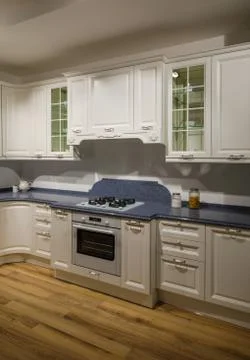 Interior of modern kitchen with white cabinets 스톡 사진