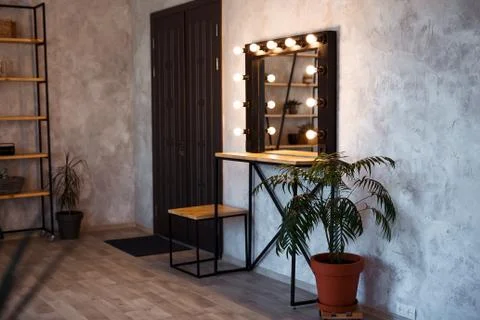 Interior of modern makeup room. Loft dressing room. Stock Photos