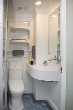Interior of a modern minimalistic small bathroom Stock Photos