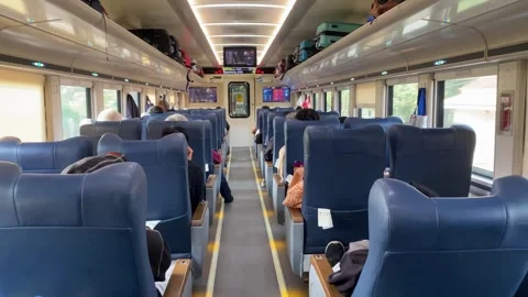 Interior of a modern passenger train (Taksaka Executive Class). Video stock 343294456