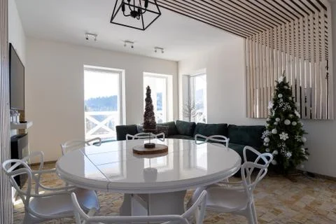 Interior of modern spacious kitchen with white walls, decorative wooden eleme Stock Photos