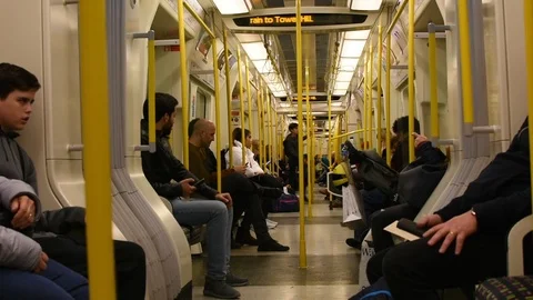 Interior of a modern train in the London subway.  스톡 동영상 99407103