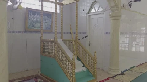 Interior of mosque prayer area with mihrab and pulpit in Ngafan Vídeos de archivo 332652596