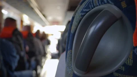 Interior of a moving bus with passengers seated in 4k slow motion 60fps Stock Footage 284218799