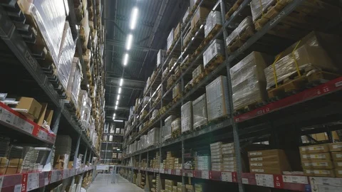 Interior of a multi-level warehouse. Steadicam shot Stock Footage 102699554
