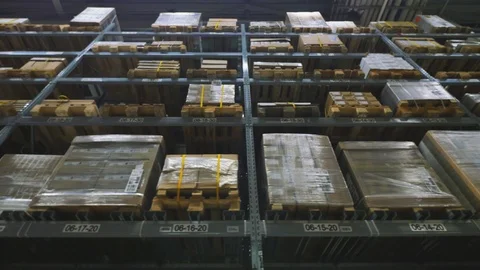Interior of a multi-level warehouse. Steadicam shot Stock Footage 102699581