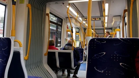 Interior of new Flexity2 Blackpool tram as passengers board at in Fleetwood. Stock Footage 80682211