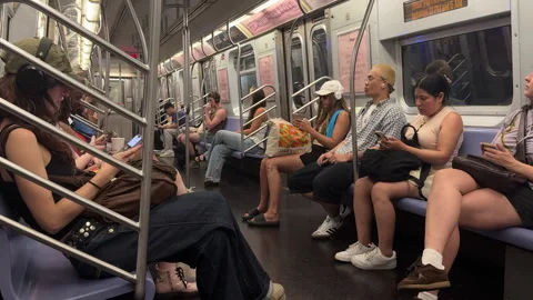 Interior of NYC Subway with Diverse Passengers, people inside subway Stock Footage 312466050