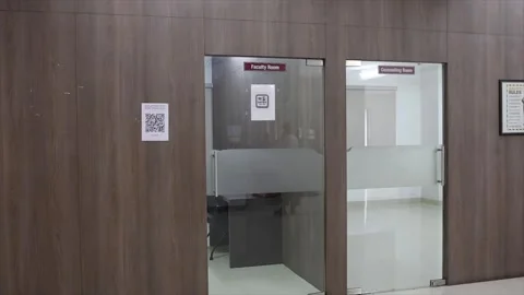 Interior Office Corridor View Featuring Faculty Room and Counseling Room Glass Stock Footage 334580581