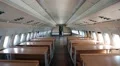 Interior of old airliner with desks HD Footage