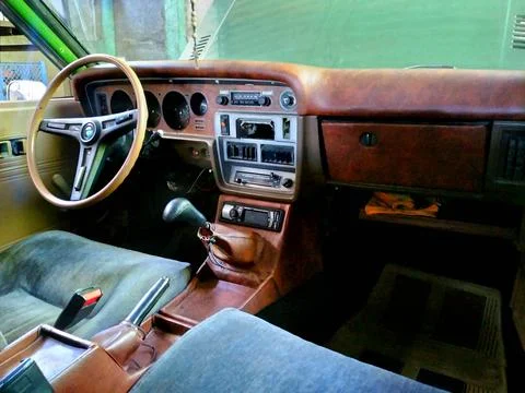 Interior of an old car, dashboard, controls, gearshift Stock Photos