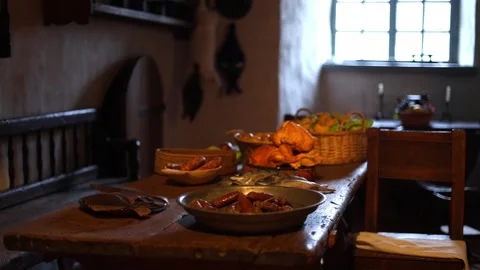 Interior of an old castle kitchen with medieval-style food  4K Stock Footage 321154325