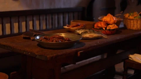 Interior of an old castle kitchen with medieval-style food  4K Stock Footage 321154532