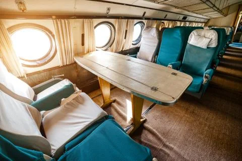 Interior of an old passenger plane. Stock Photos