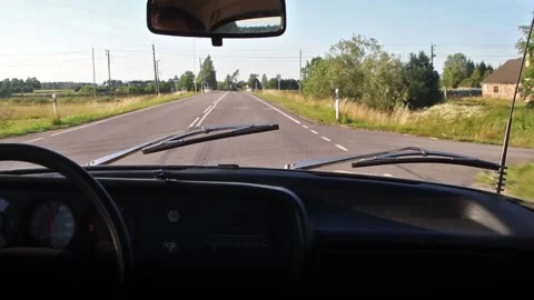 The interior of an old retro unic car driving slowly over a railway crossing Stock Footage 135546340