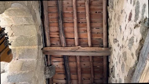 Interior of an old stone bell tower seeing roof and walls with arches Stock-Footage 293299734