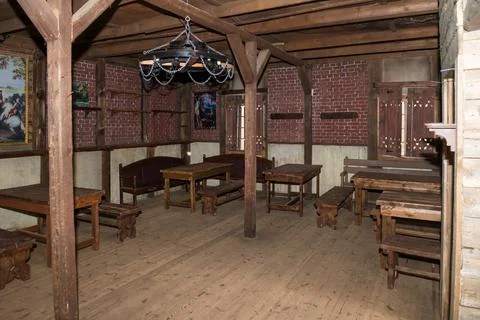 Interior of an old tavern with empty tables Foto stock