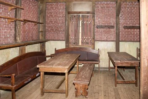 Interior of an old tavern with empty tables Stock Photos