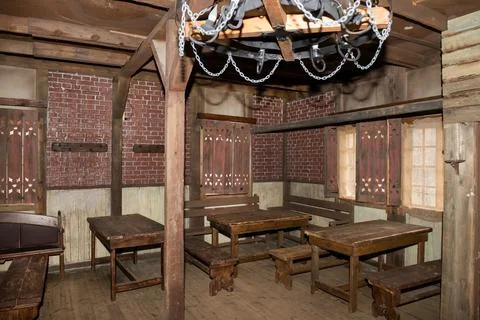Interior of an old tavern with empty tables Stock Photos