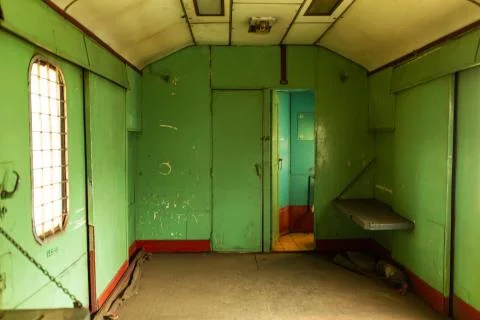 Interior of an old train carriage for transporting prisoners Stock Photos