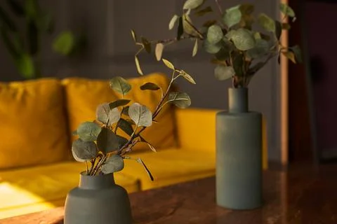 The interior of an open space with a designer modular yellow sofa, coffee table Stock Photos