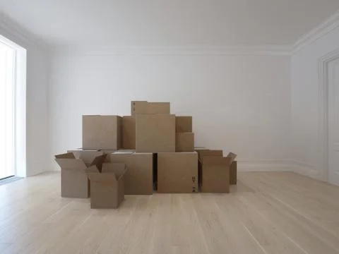 Interior with packed cardboard boxes for moving to a new place. 3d image Stock Photos