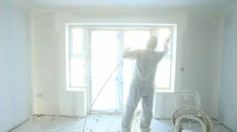 Interior Painter spraying walls with emulsion Video stock 12185446