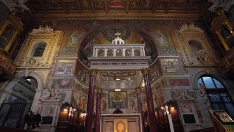 Interior pan up to ceiling of the Basilica of Santa Maria in Trastevere Stock Footage 248606069