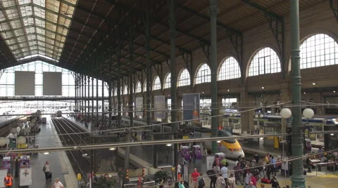 Interior Paris Central train station busy platform tourist people travel commute Stock Footage 44400389