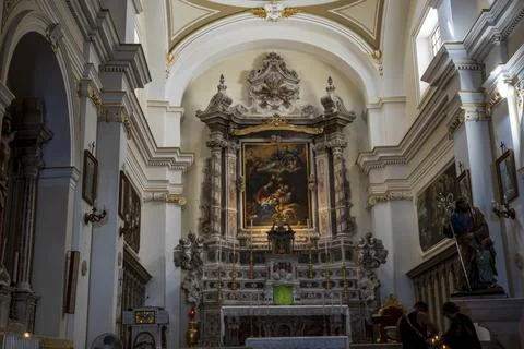 Interior of a Parrocchia di S. Giuseppe shows an ornate marble altar Stock Photos