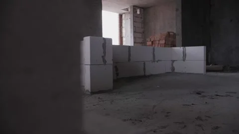 Interior partition made of bricks under construction Stock Footage 175910818