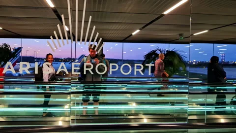 Interior perspective of Charles de Gaulle Airport at evening light Stock Footage 325373402