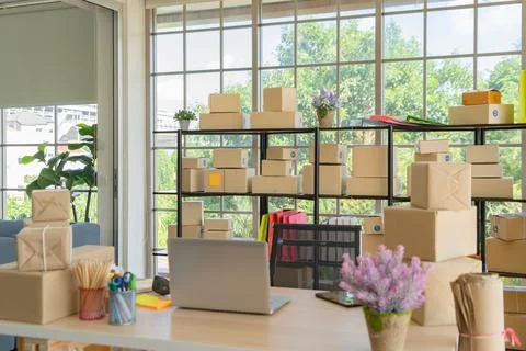 Interior of Postal parcel packaging carton box delivery and computer notebook 写真素材