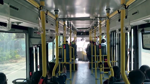 Interior POV Moving Electric Bus India Passengers Commuting Видео 335293764