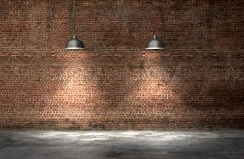An interior with a red brick wall and concrete floor Foto stock