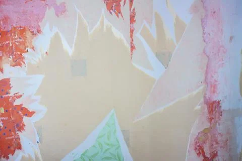 Interior renovation process revealing old wallpaper layers and unfinished pla Stock Photos