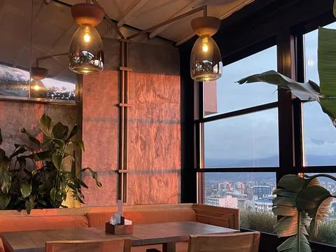 Interior of restaurant, table and window. Wooden design, detail Stock Photos