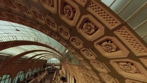 Interior roof arch decorations in Musee d'orsay, high angle pan Stock Footage 245780109
