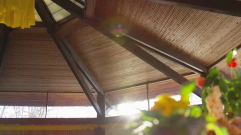 The Interior Roof of an Empty Buddhist Temple as the Sun Rays Shine Through Stock Footage 208754443