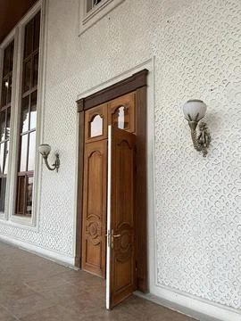 Interior of a room with arabic pattern and wooden doors Stock Photos