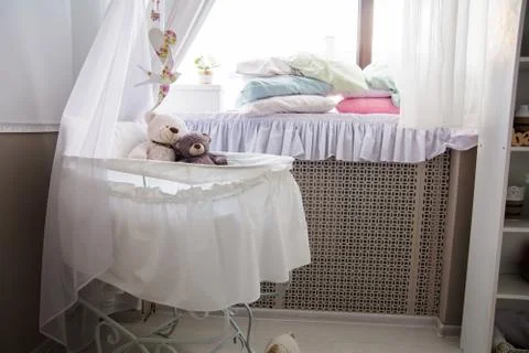 Interior of the room with a cot and window Stock Photos