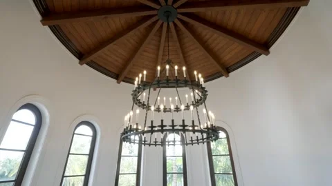 Interior of room with dom shaped ceiling. Ceiling exposed wooden beams radiating Stock Footage 293851053