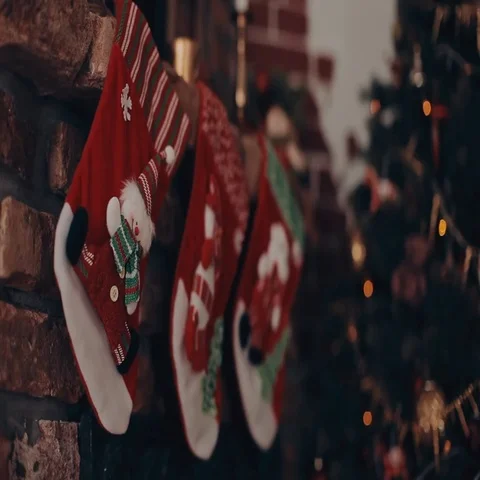 Interior room with elegant Christmas tree, fireplace and Christmas socks Video stock 69541774