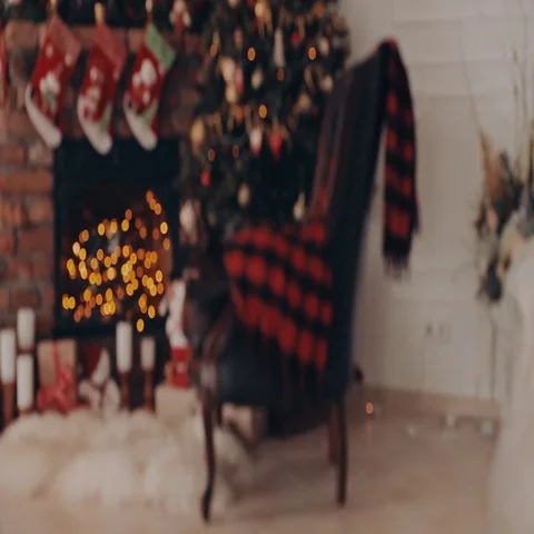 Interior room with elegant Christmas tree, fireplace and Christmas socks Video stock 69542109